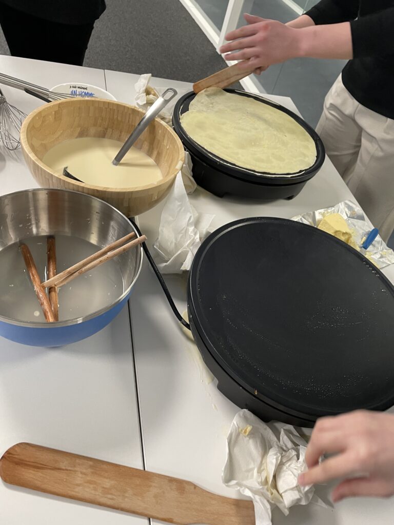 Students making their own crepe