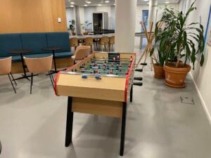 Foosball table in a lounge area of FTC Paris campus