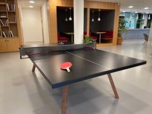 Modern ping-pong table in a shared space at FTC Paris