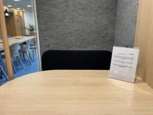Interior view of a quiet office pod with soft seating at FTC Paris